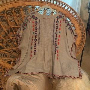 Johnny was tunic size S